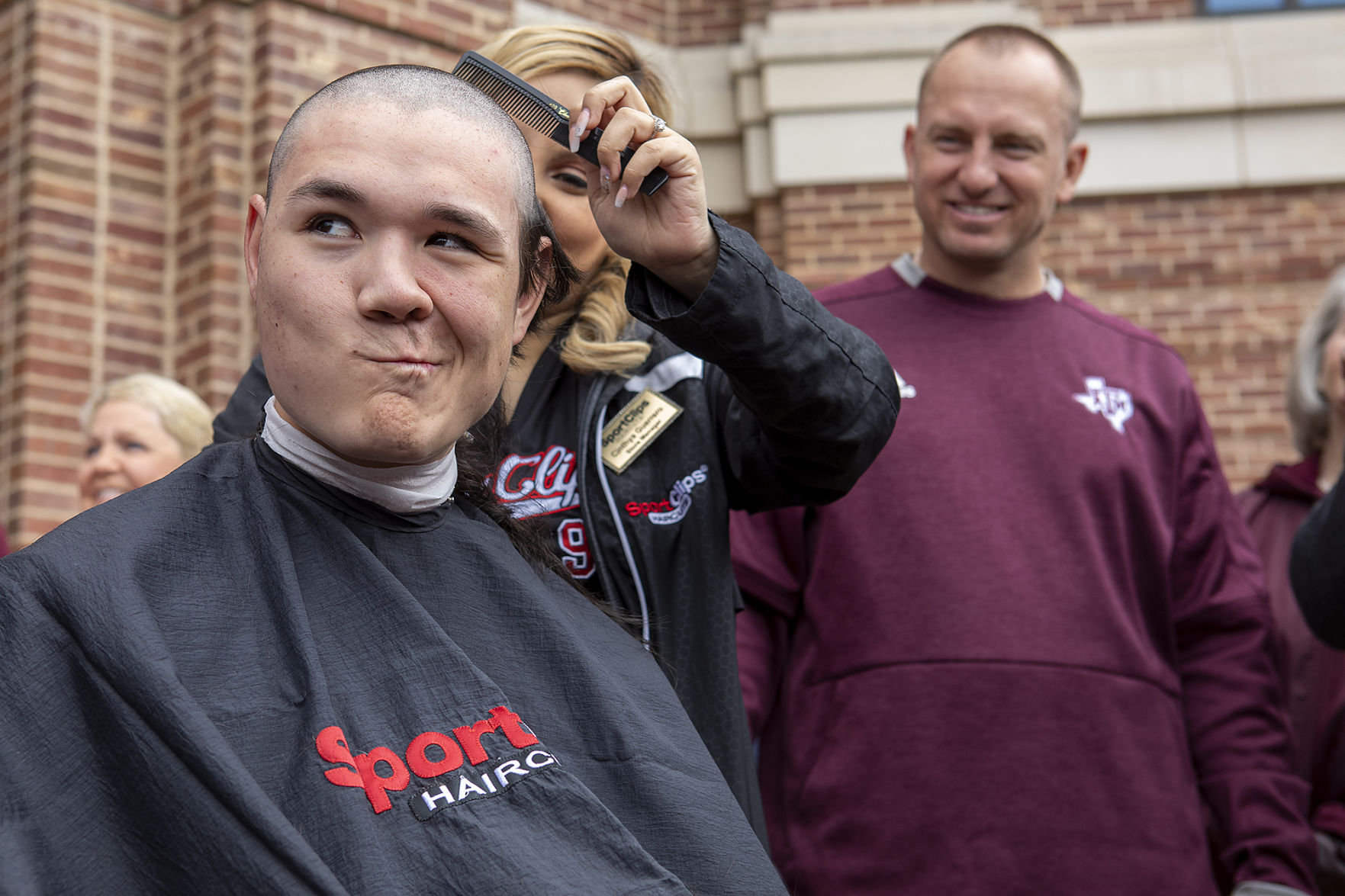 A&M baseball head shaving for cancer